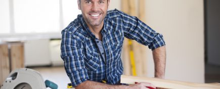 Smiling construction worker at work