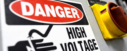 High voltage sign, electrical board close up