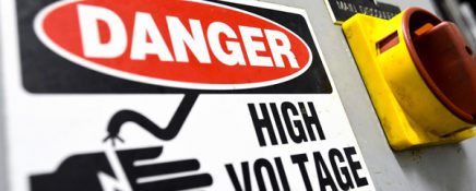 High voltage sign, electrical board close up