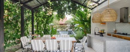 Dining room table and chairs on open kitchen