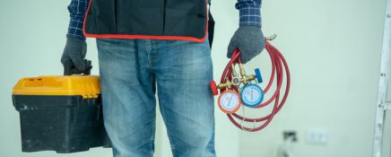 The technician is checking the air system.