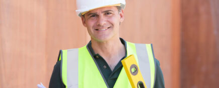 Home inspector smiling at the camera after home inspection training.