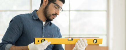Carpenter working in a workshop after home renovation training