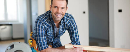 A home renovation technician at a worksite after completing home renovation training