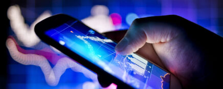 A person using a mobile phone to track real-time