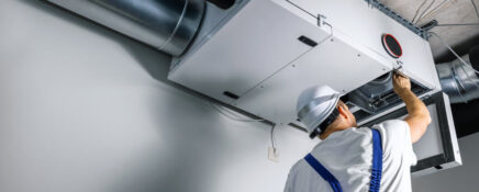 HVAC training graduate working on industrial HVAC System